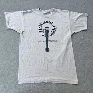 Vintage 80s wind and wood guitar and flute graphic shirt
